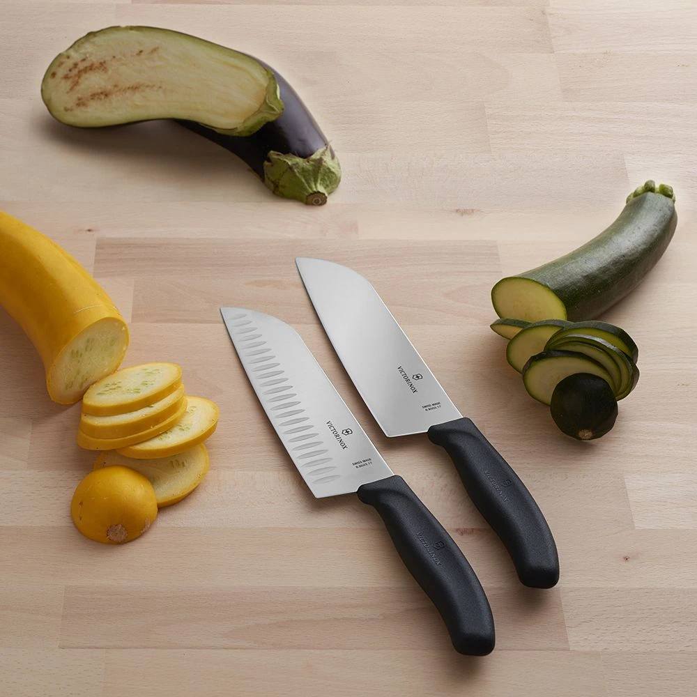 Victorinox Swiss Classic 17cm Santoku Knife Fluted Blade Orange (6852617L9B) - Image 6